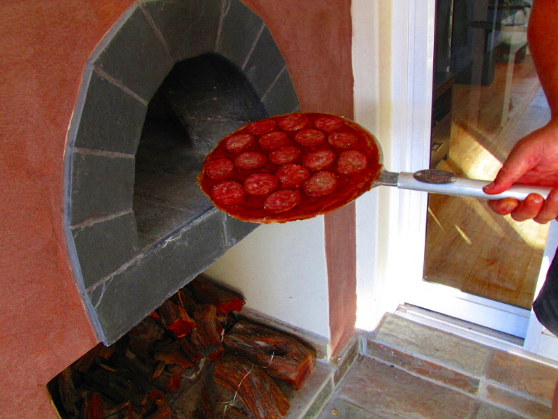 Pizza into oven